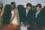 signing the papers after the wedding3.jpg (47627 bytes)